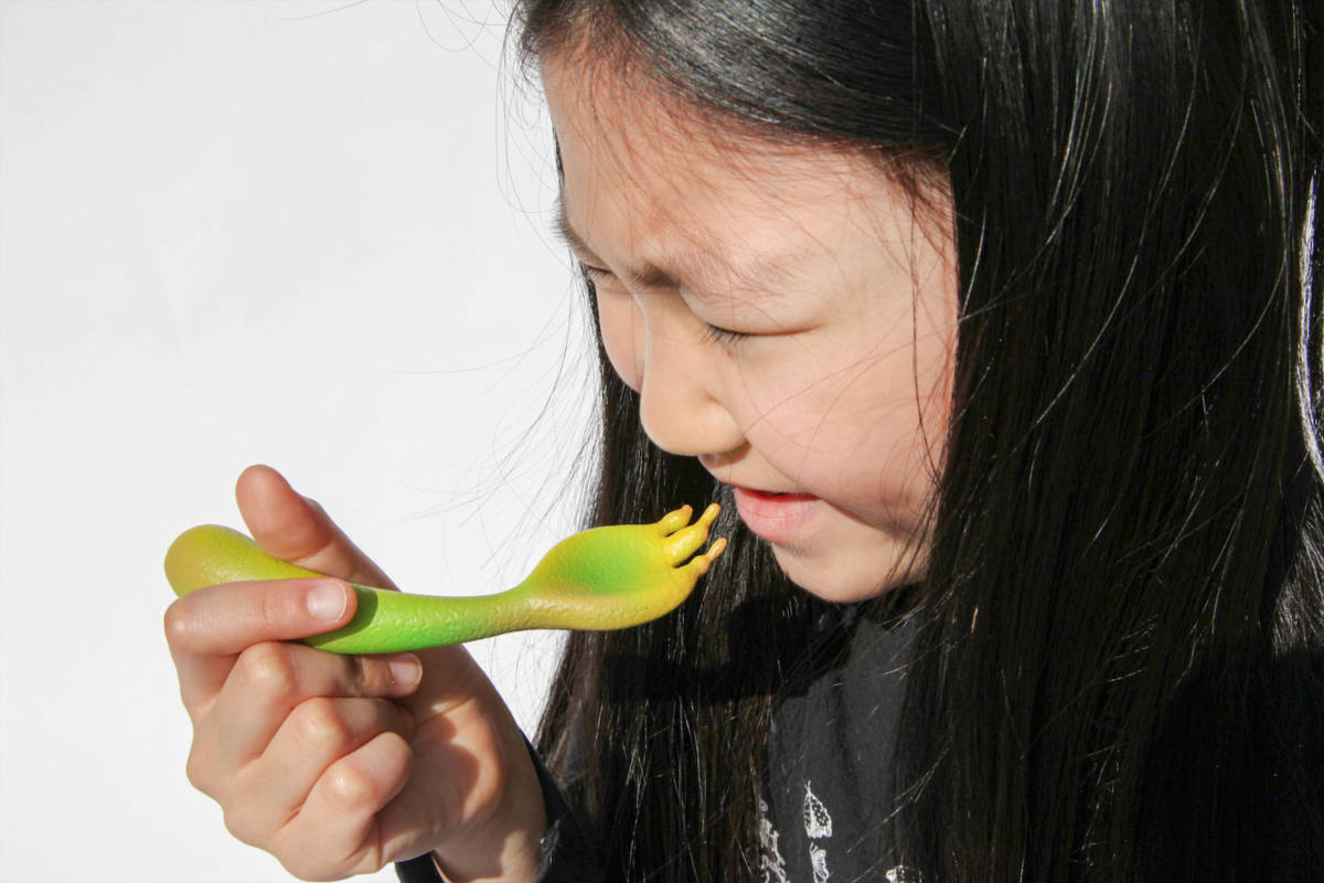 Kid using the sour spoon