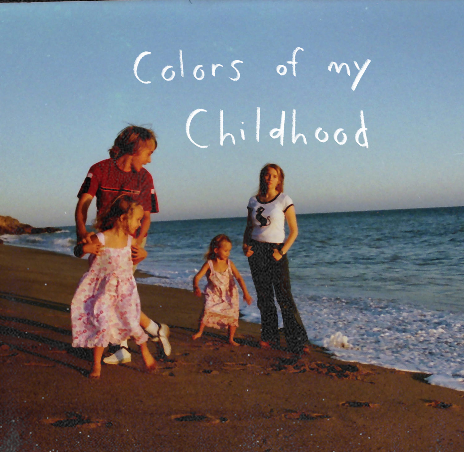Colors of my Childhood opening photo shows a film picture of my siblings and I at the beach when I was a child.