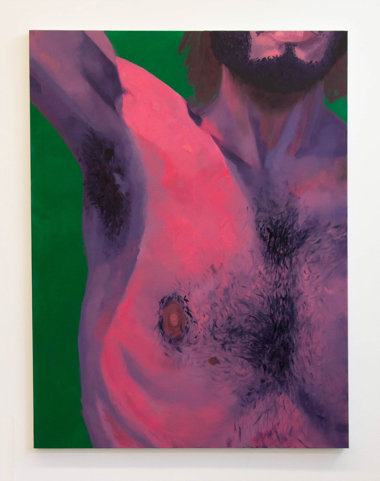 This image displays a body composed of pinks and purples in a vast green space.  A front facing man with his arm reaching upwards fills the majority of this oil painting. The image is cropped just above his armpit, lips, and midsection, displaying an extreme close up of his chest hair, armpit hair, and beard.