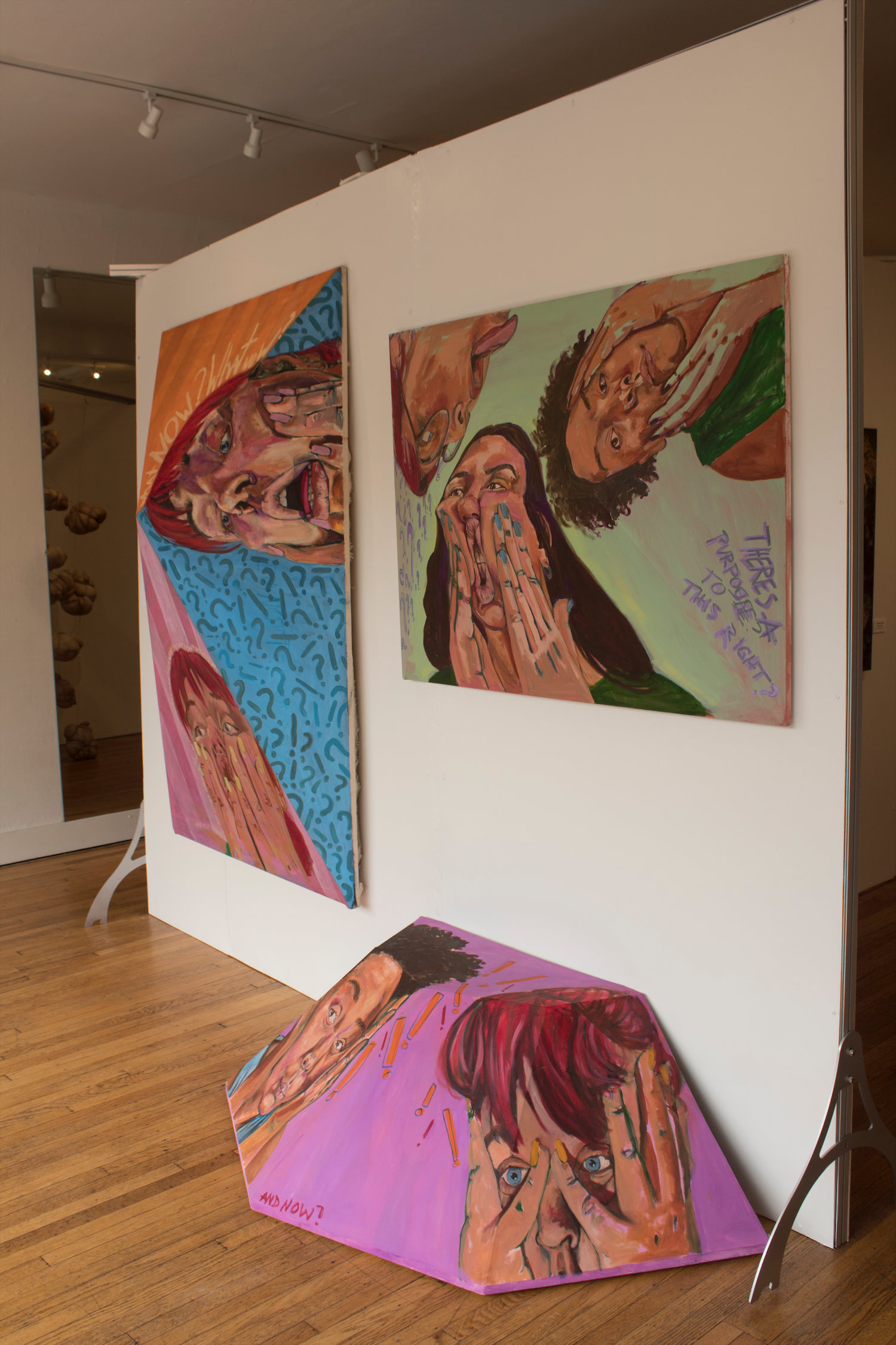 This image shows all three works together displayed on a white wall. This is taken from the right most side of the work.